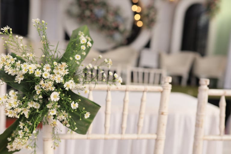 A delicate floral detail sets a romantic and serene atmosphere at an elegant wedding venue.
